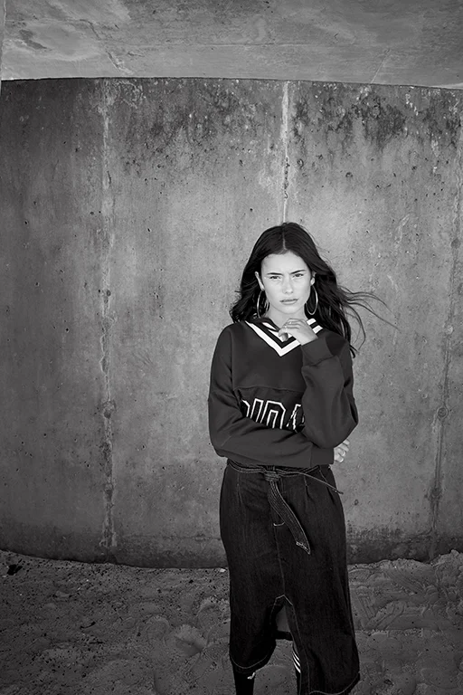 ADIDAS sweatshirt, socks; H&M skirt; REEBOK shoes; STYLIST’S OWN jewelry