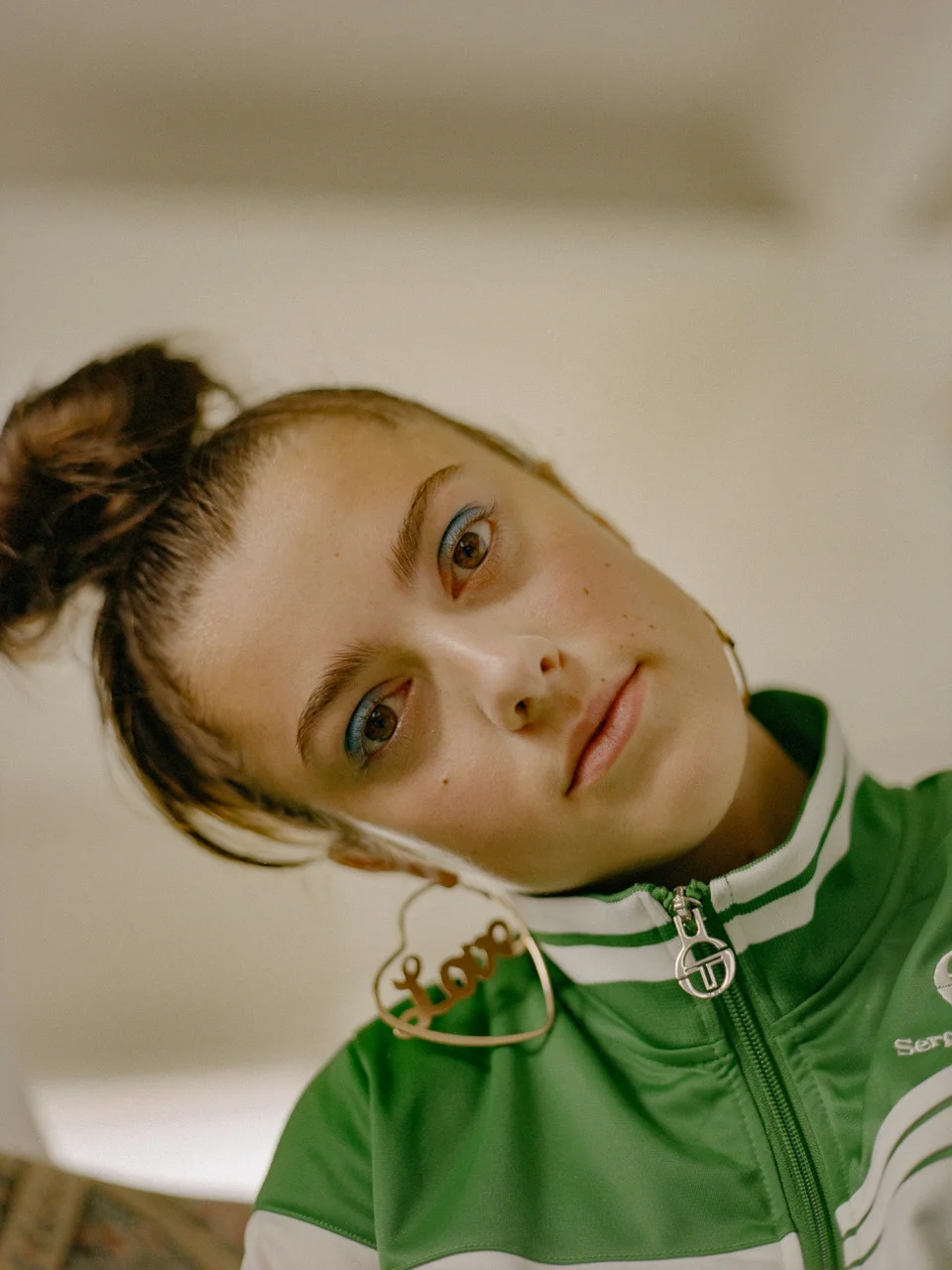 SERGIO TACHINNI top; BERSHKA earrings