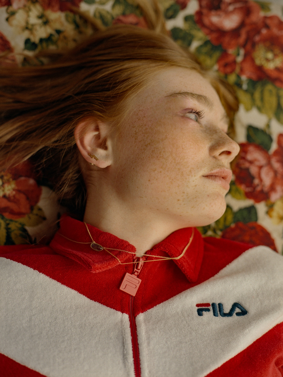 FILA (URBAN OUTFITTERS) top; MODEL’S OWN necklaces
