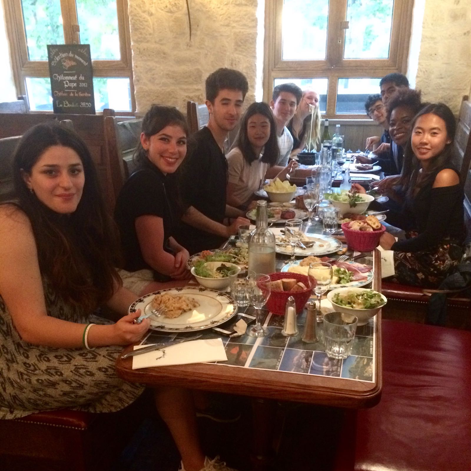 Nicolas and other Sage Corps Paris fellows enjoying an authentic French dinner.