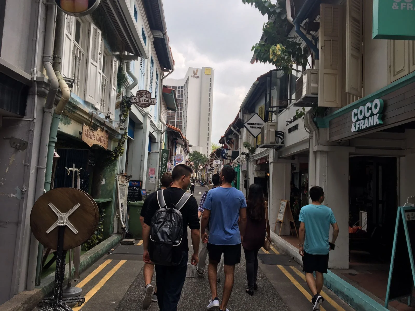 Tommy and his cohort exploring the streets of Singapore.