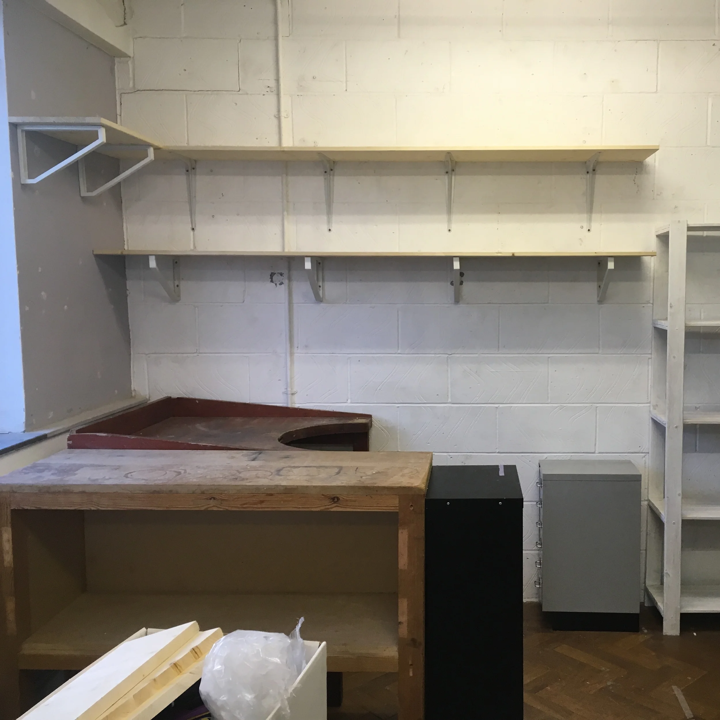 Getting things placed in my new studio and putting shelves up.