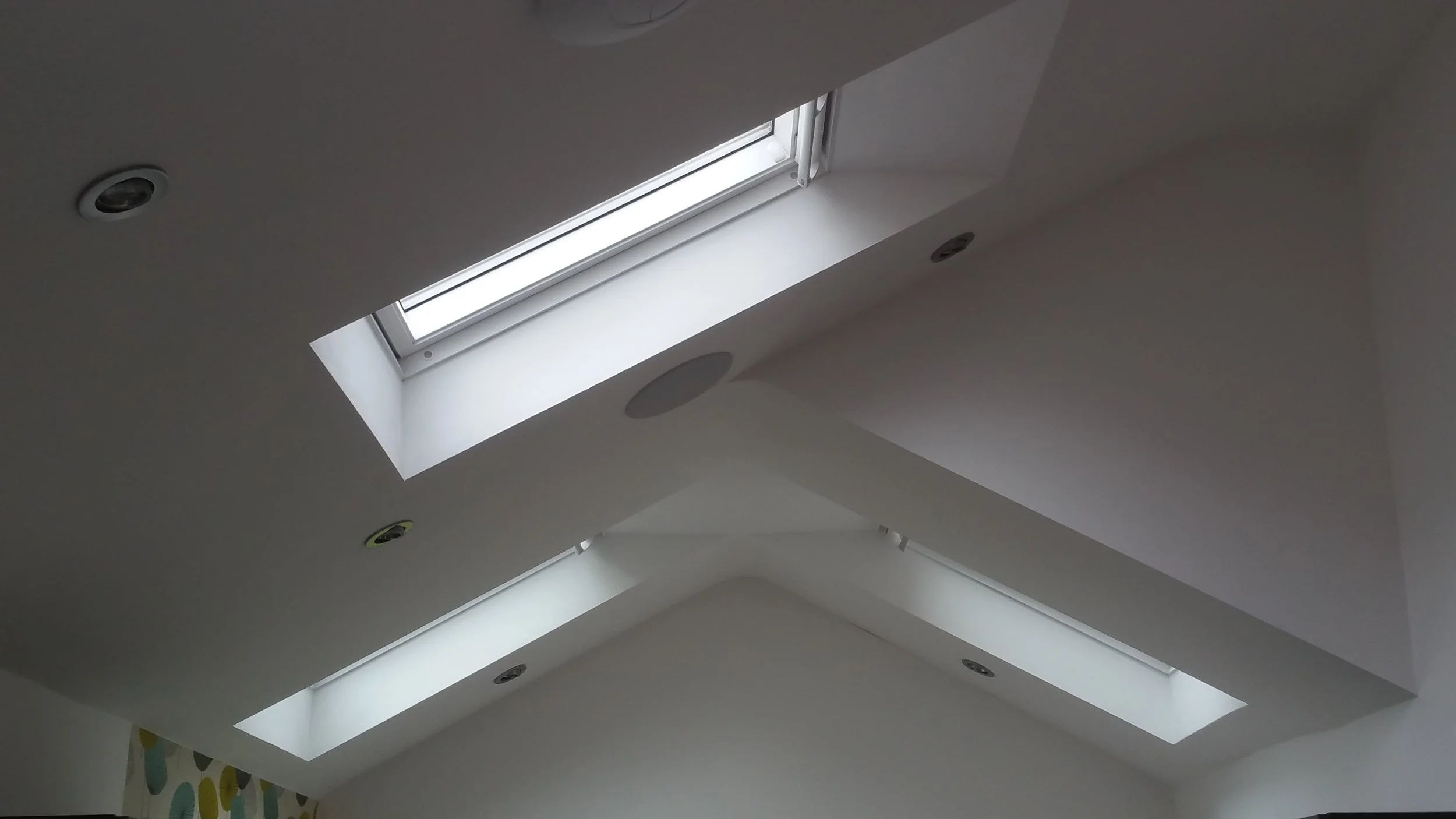 We splayed the reveals on the rooflights to bring in more light, and curved the ceilings to soften the effect.