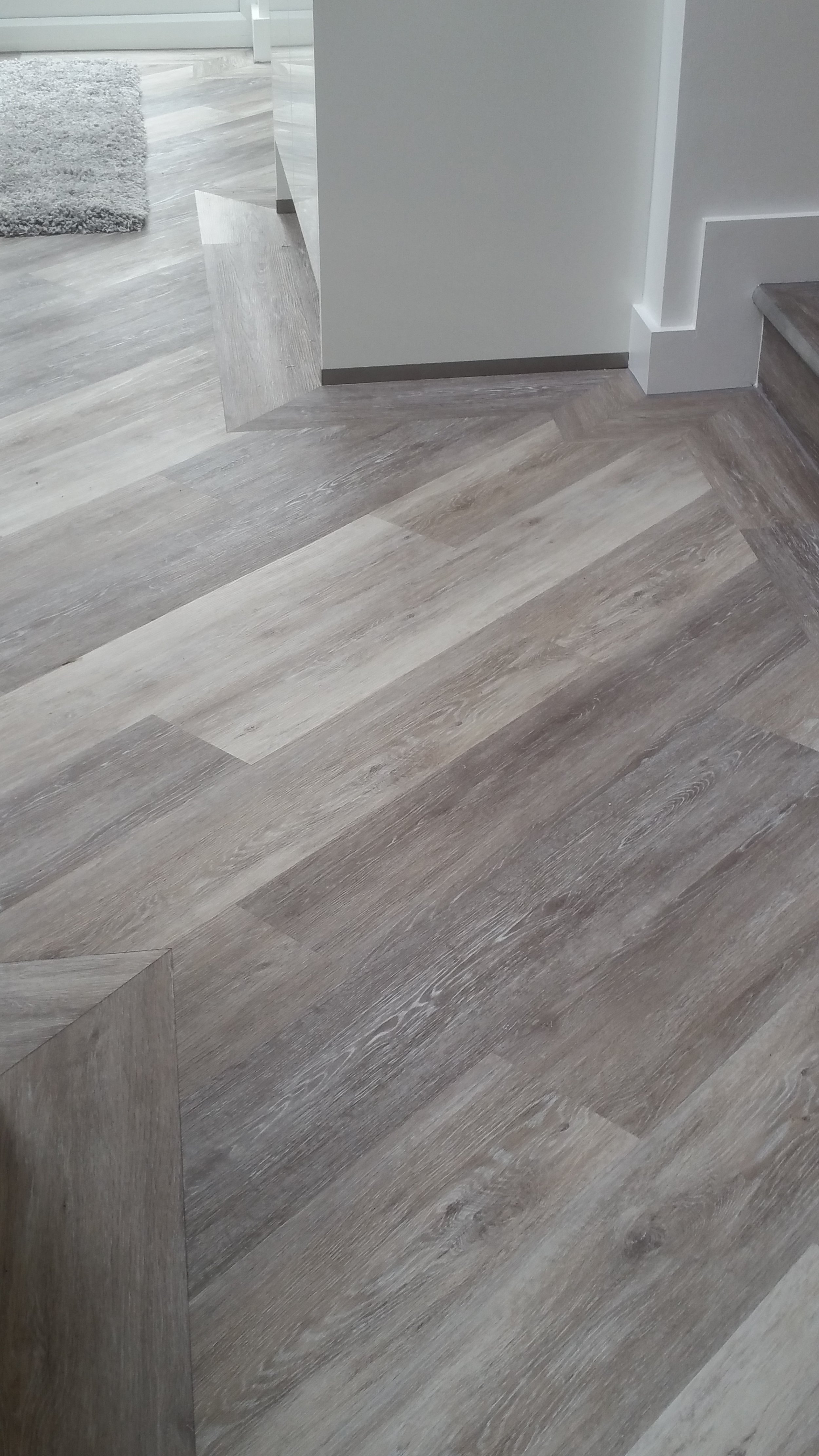 Even floors need designing. We have our own team of flooring professionals. Whether it's luxury vinyl tiles like these, timber or tiles, we have a solution for the floor in every room.
