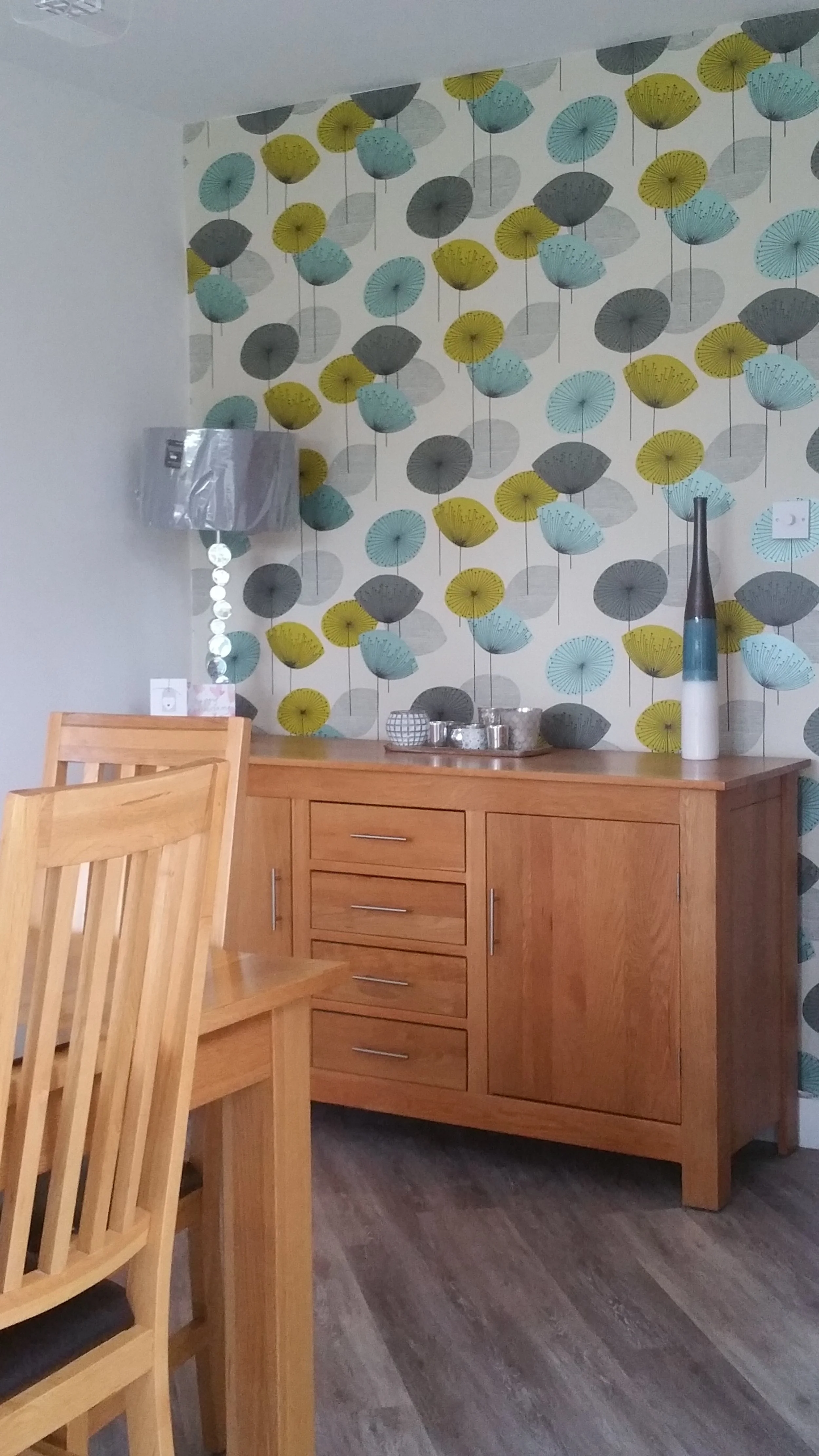 Our decorators finished the room with a splash of colour, and helped put the new furniture in place.