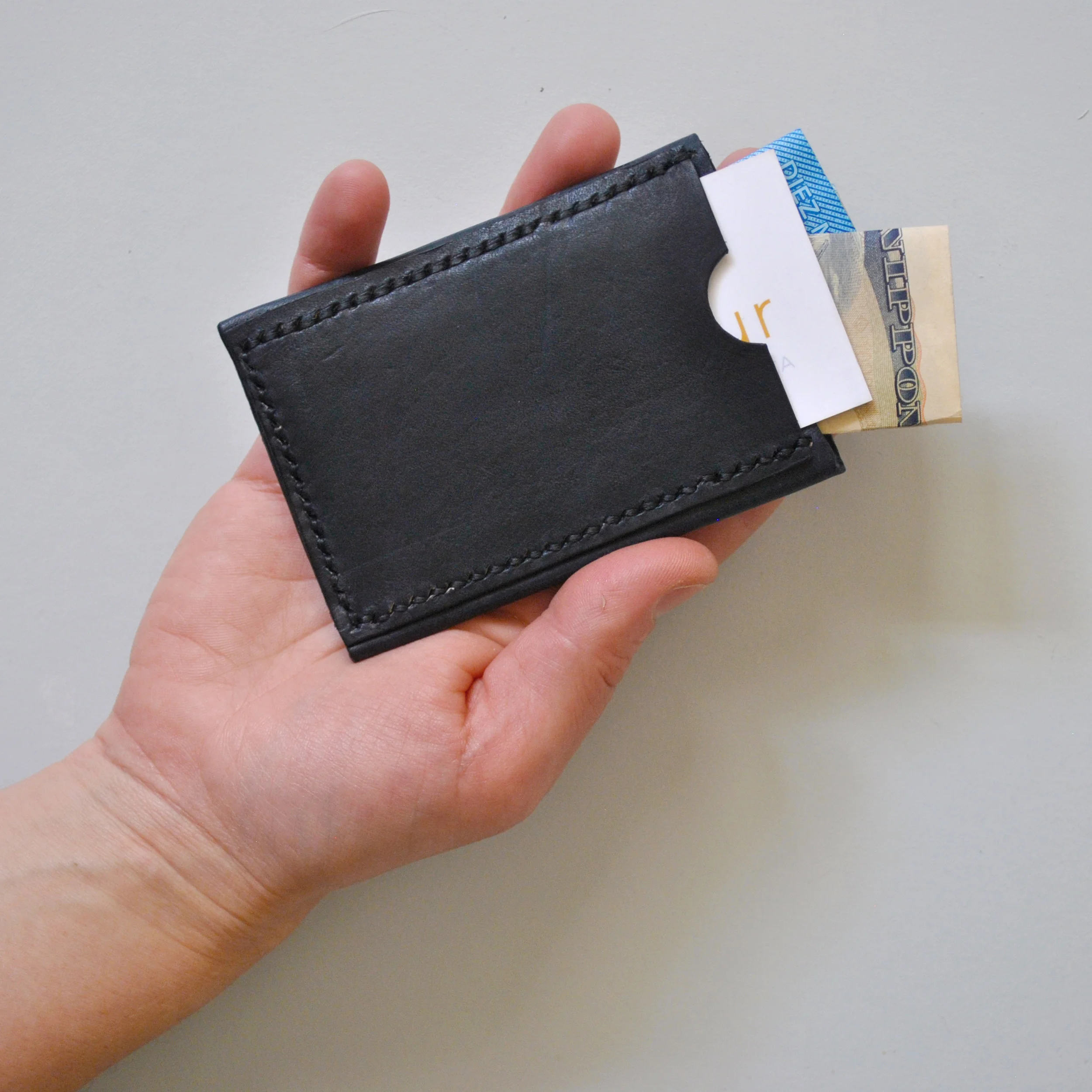 miniwallet_black_hand_sq.jpg
