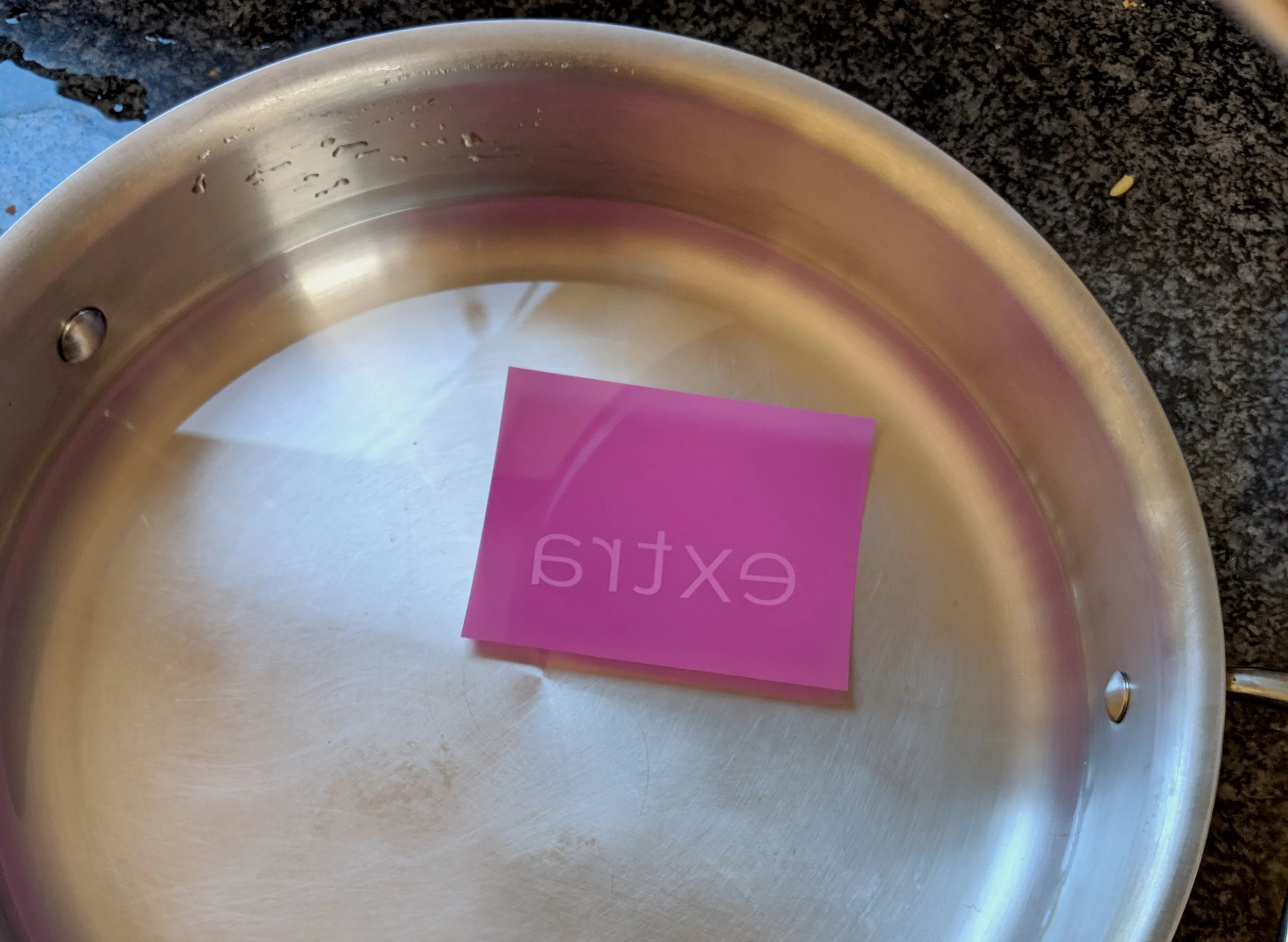 You’ll start to see your image form immediately upon dipping it into the water. Put a lid on it and wait 10 minutes.