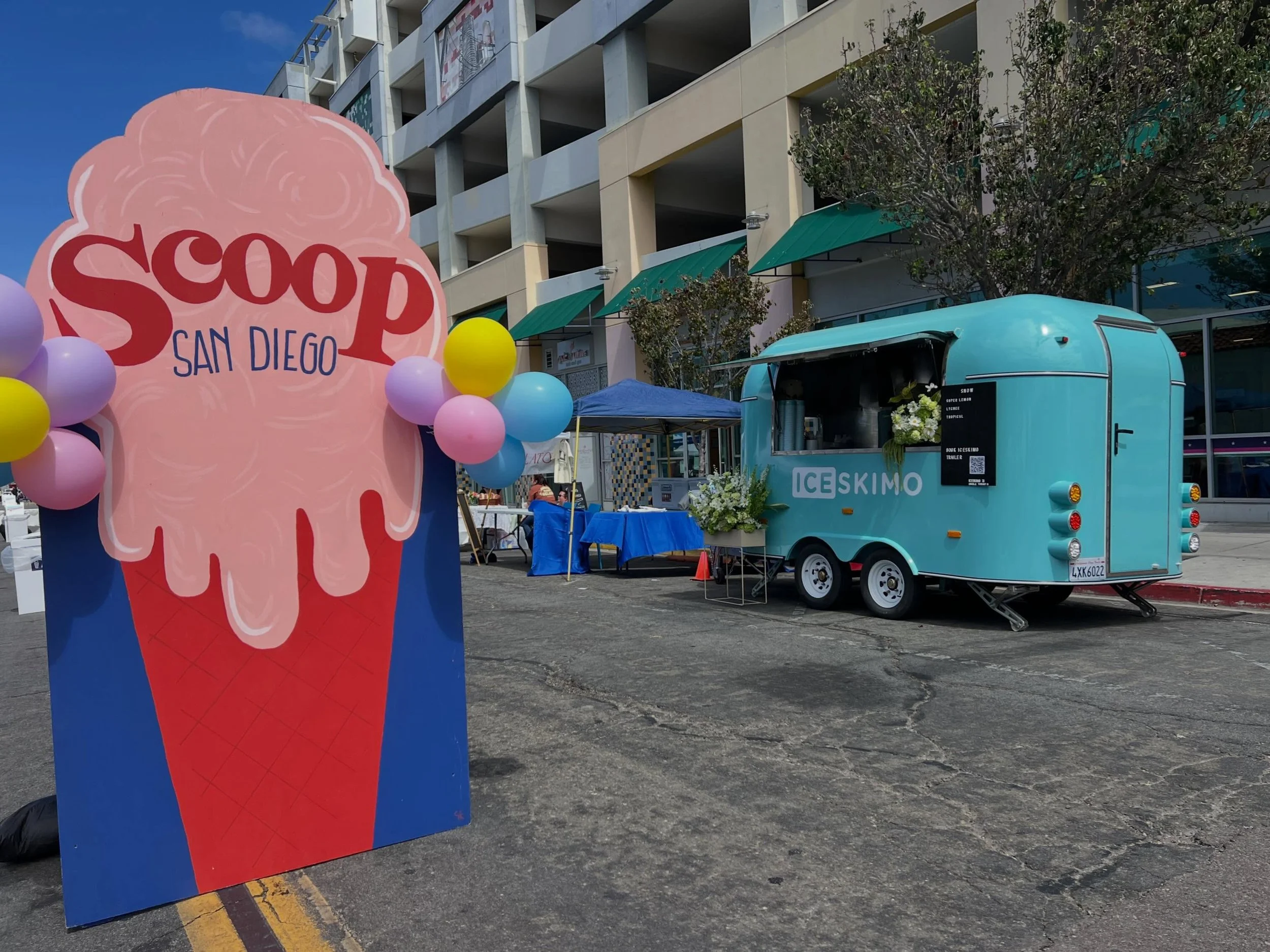 Join us at the 8th annual Scoops Ice Cream 🍨 festival today in North Park from 12-4! Big shout out to #letteitbloomfloral.co for the beautiful flower arrangement. 💐