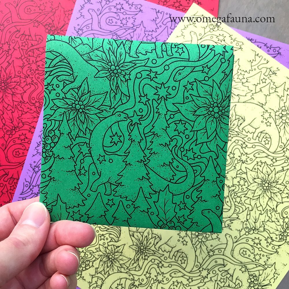 I made some printable pattern paper for my December 1st Patreon release, in addition to the monthly coloring page. I had some fun printing it onto colored paper &amp; folding into little gift card envelopes! 🎄💌🦕