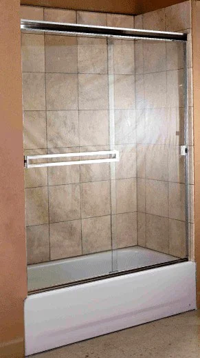 An example of a 3/16" semi-frameless shower enclosure above a fiberglass tub with tiled walls. 