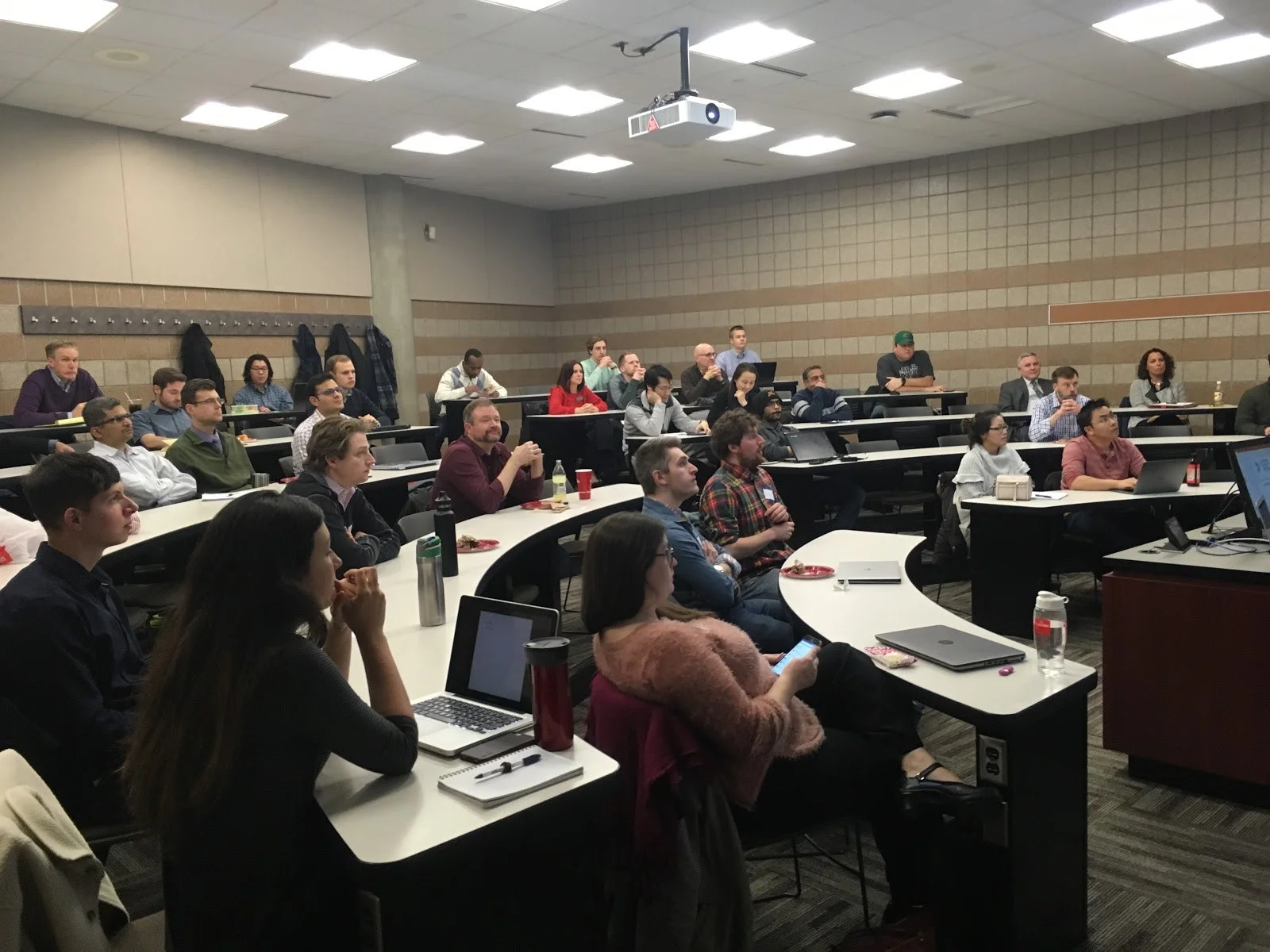 Present and future data science superheroes listening to project pitches. Join them!