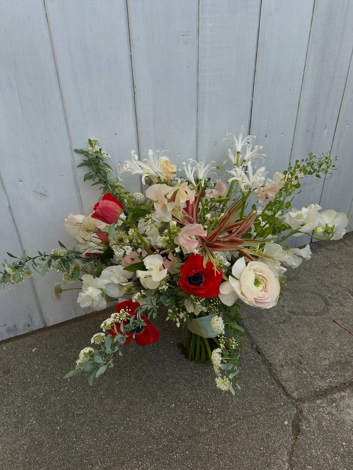 Last winter&rsquo;s first bouquet. 

Still in love with Alison&rsquo;s unique color palette! 

#bridalbouquet #winterwedding #winterweddingflowers #redwedding #weddingcolors