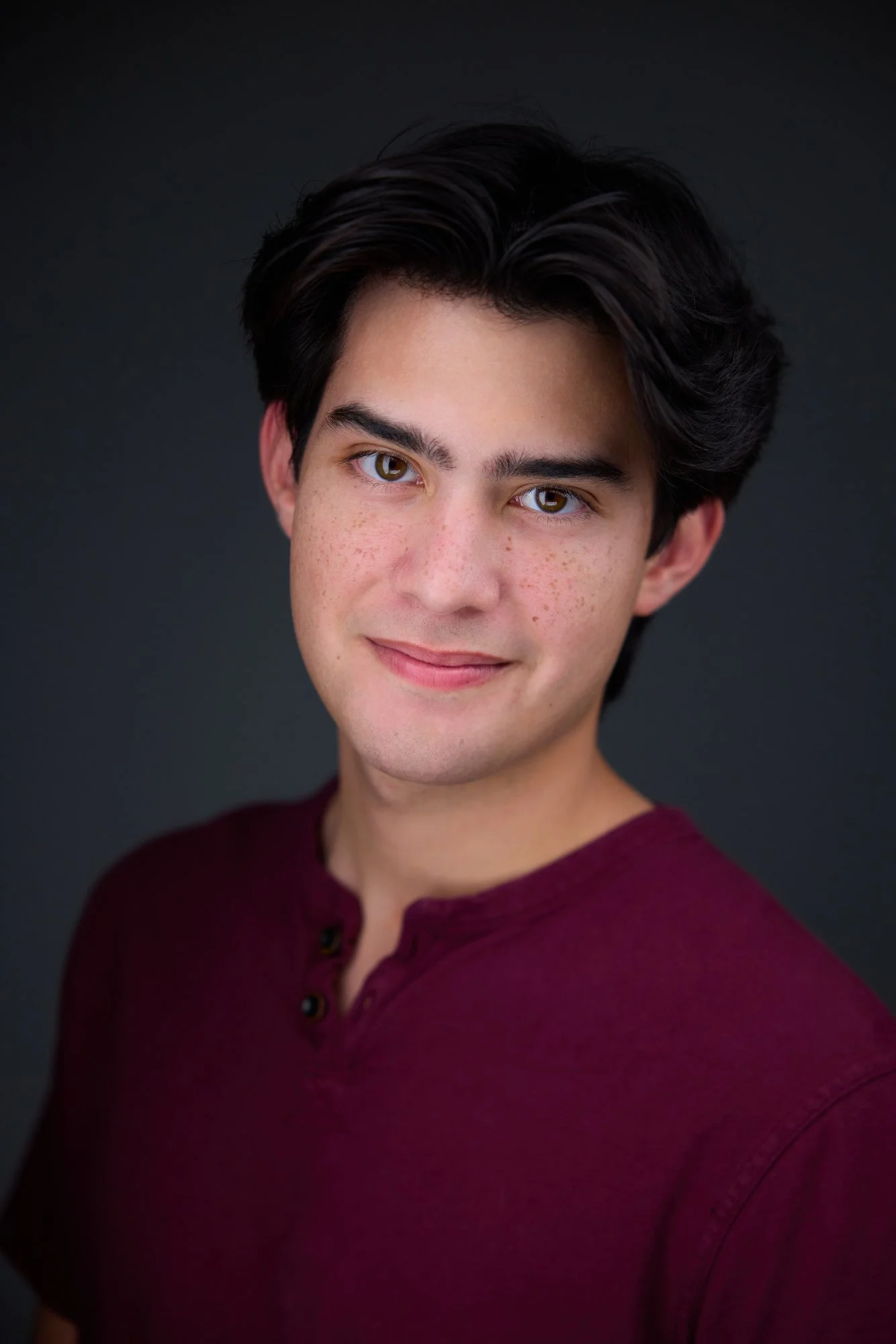 Actor headshot example - male actor in maroon henley