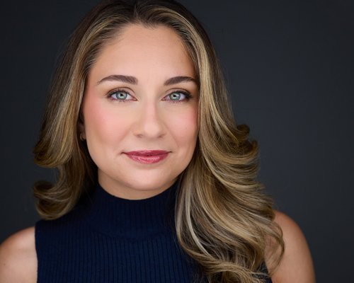 Client relaxed and prepared for a headshot session