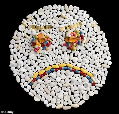 A frowny face and bad headache from all those pills.