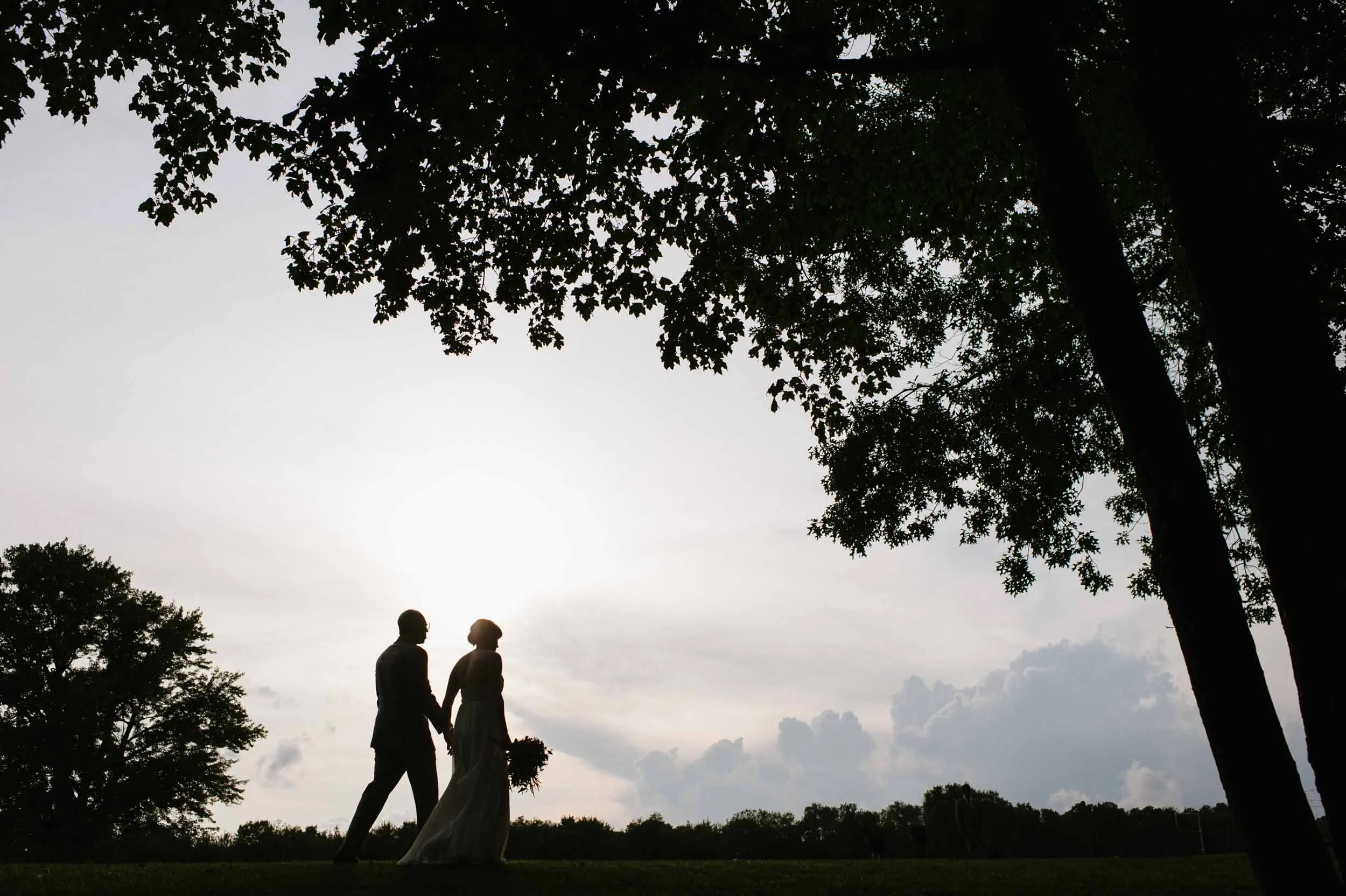 Andrea + Keenon | Candlelight Farms Inn Hangar Wedding Photography