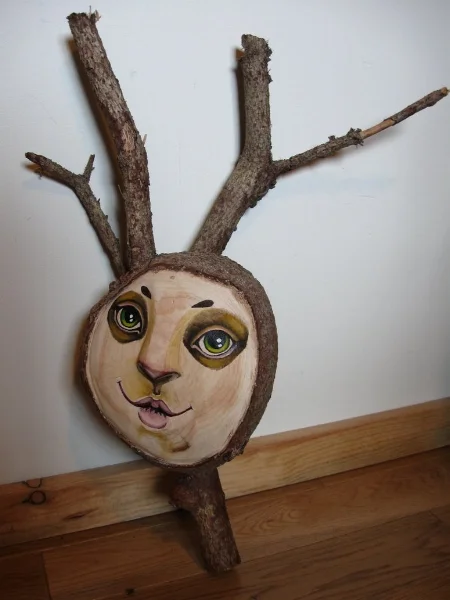 acrylic painting on sculpted wood