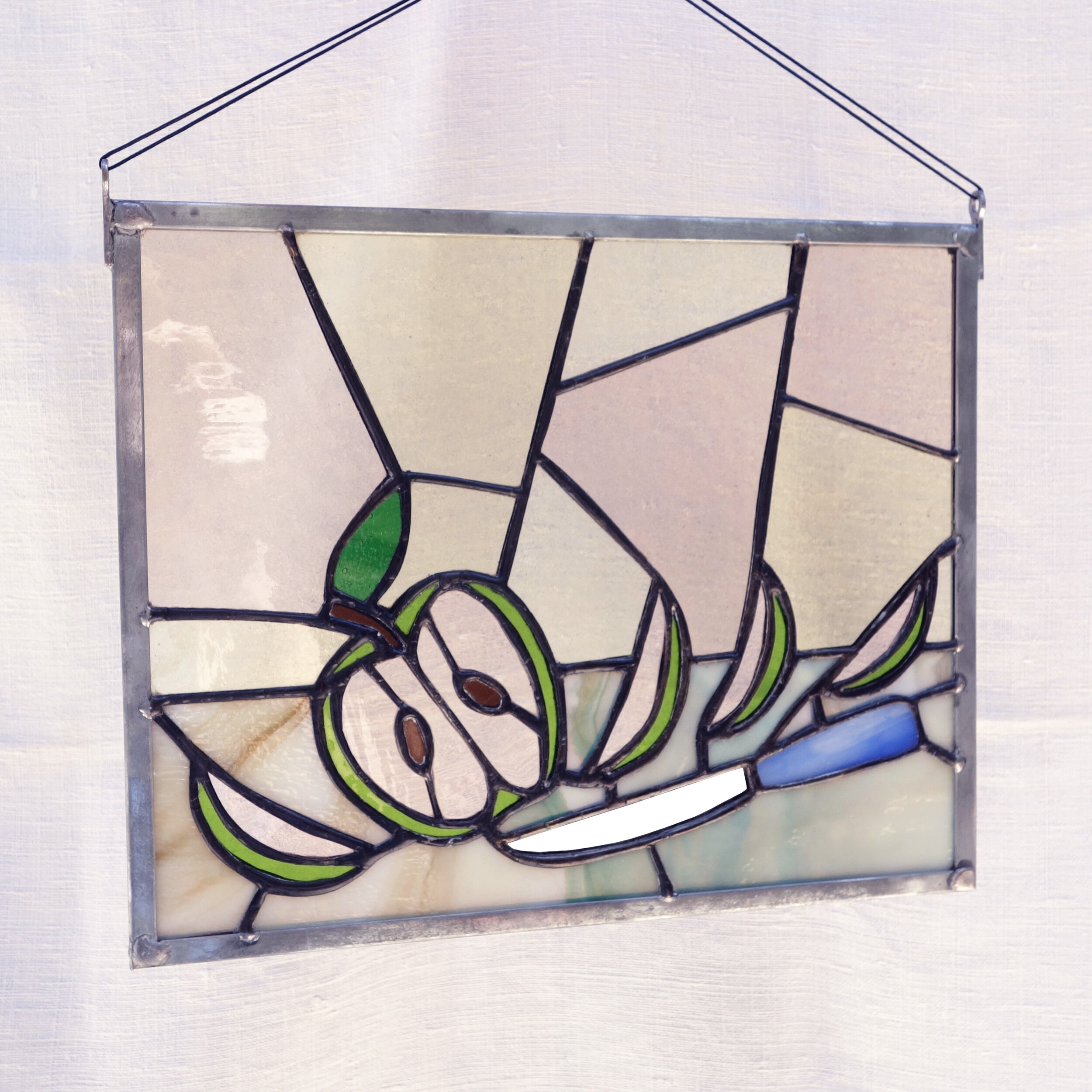 Sliced Pink Apple with Knife Sun Catcher