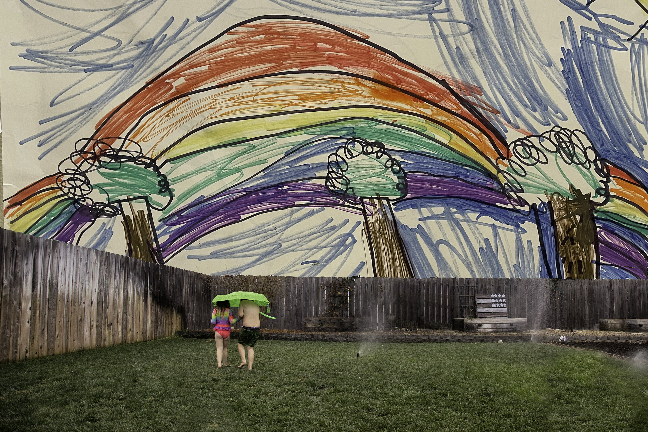 backyard rain rainbow.jpg