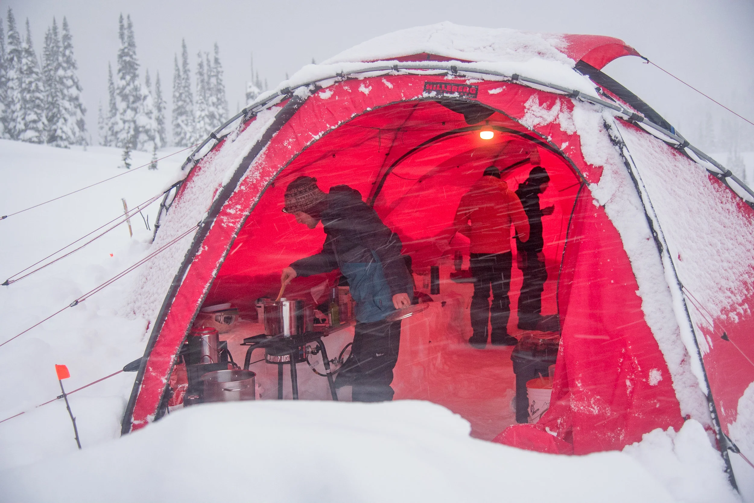 Chef Dave cooking while the storm rages on. Photo Phil Tomlinson.