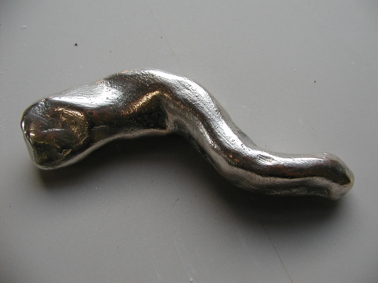 Figura c, 1995 silver plate on bronze 2.5 x 3 x 10.5 cm