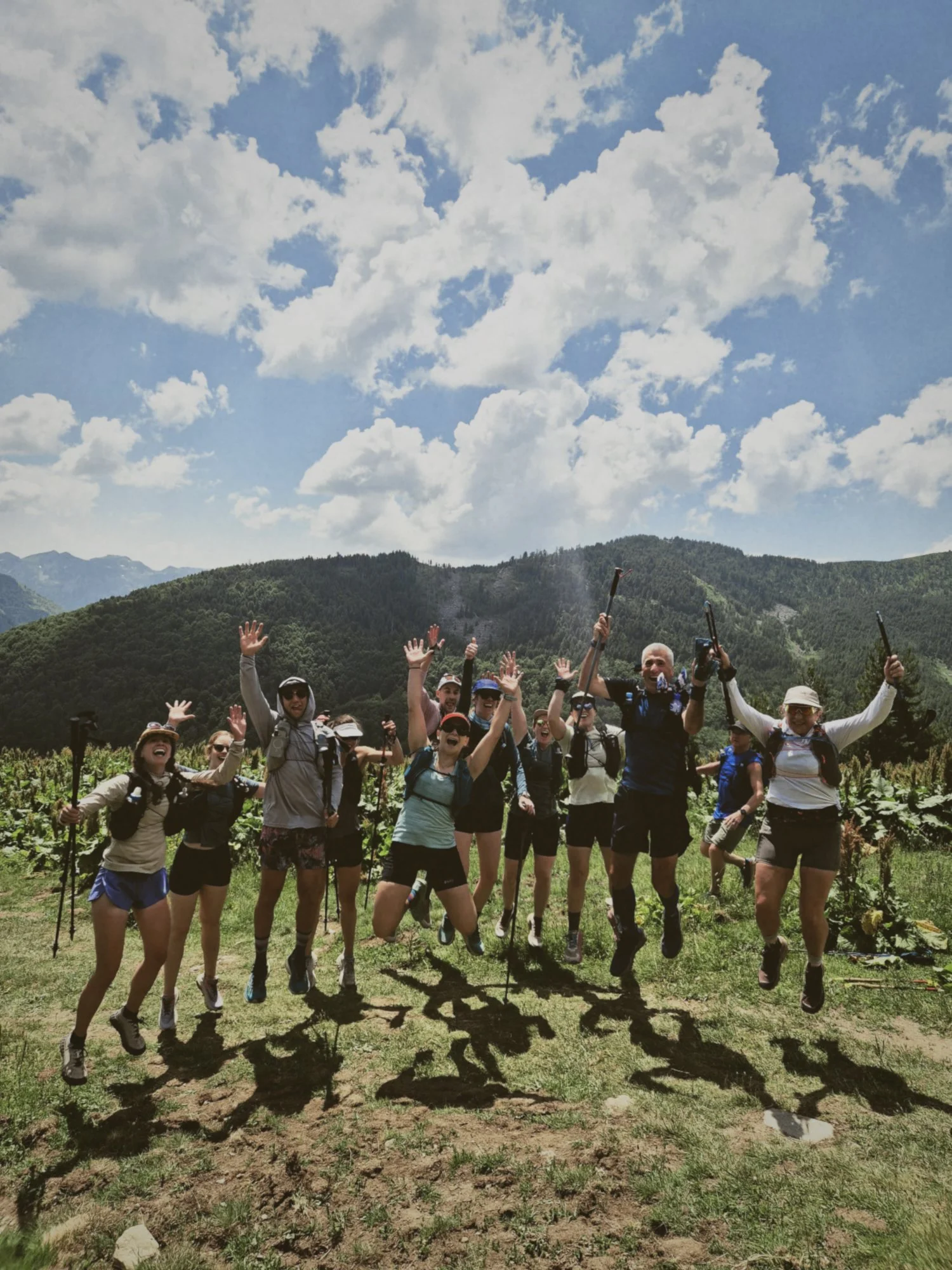 Trail runners enjoying a vista on the Peaks of the Balkans through the Accursed Mountains