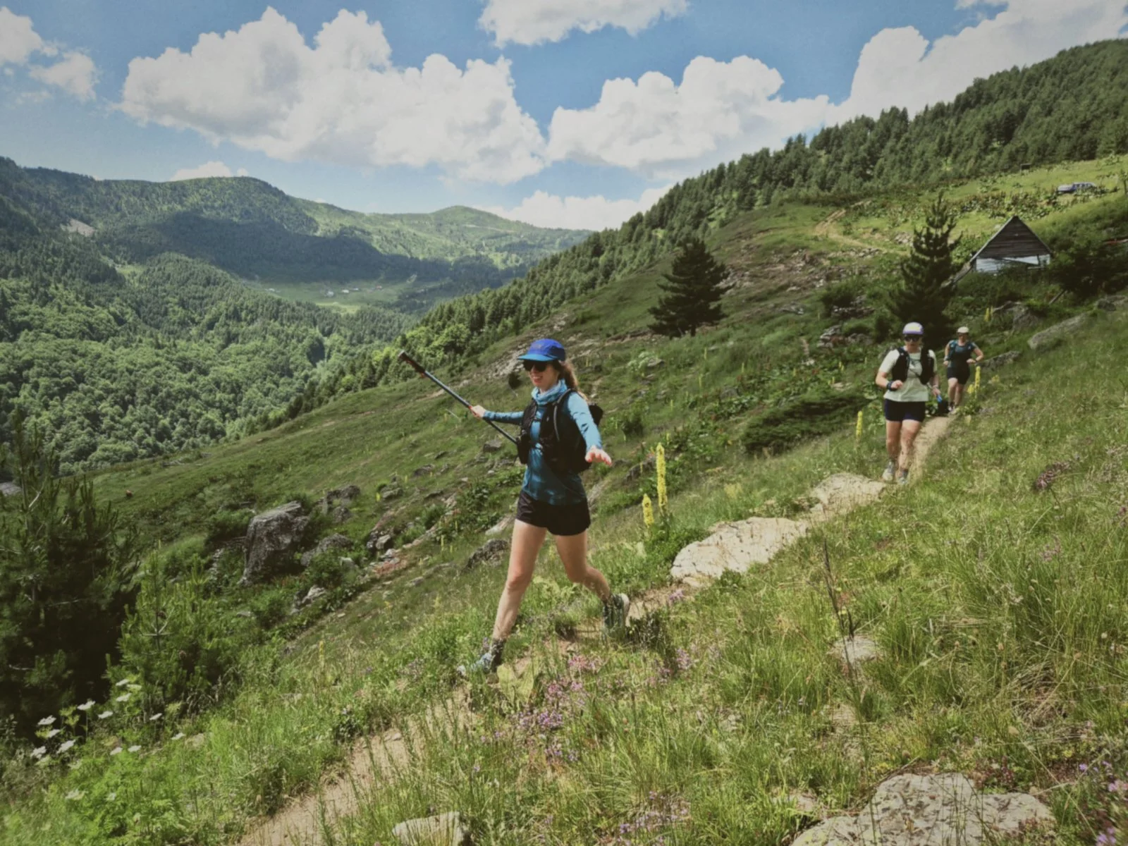 Trail runner on ridge in the Accursed Mountains, Peaks of the Balkans trail run through Albania, Montenegro, and Kosovo