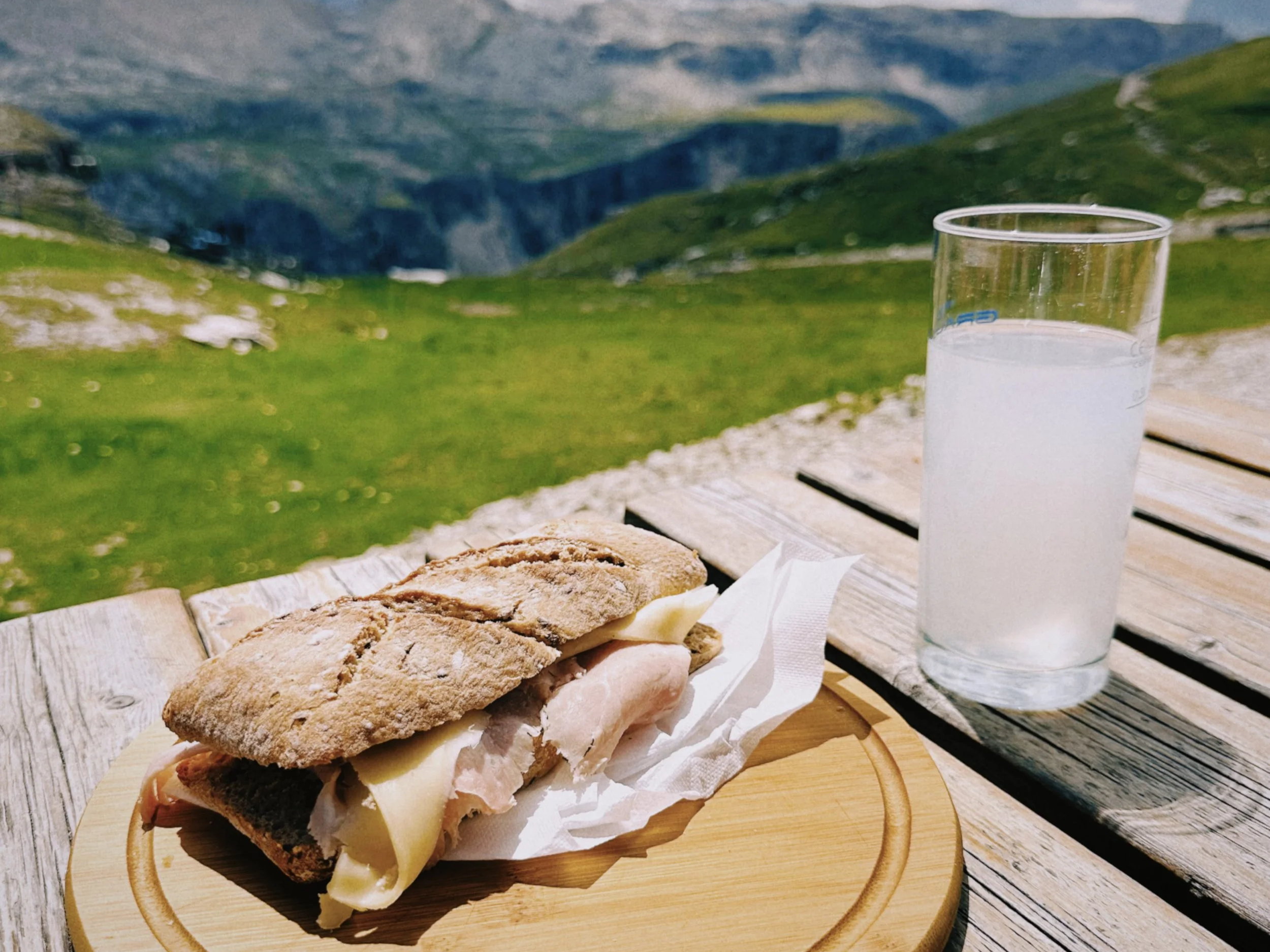 Traditional South Tyrolean lunch of speck, mountain cheese, and canederli at Dolomite rifugio
