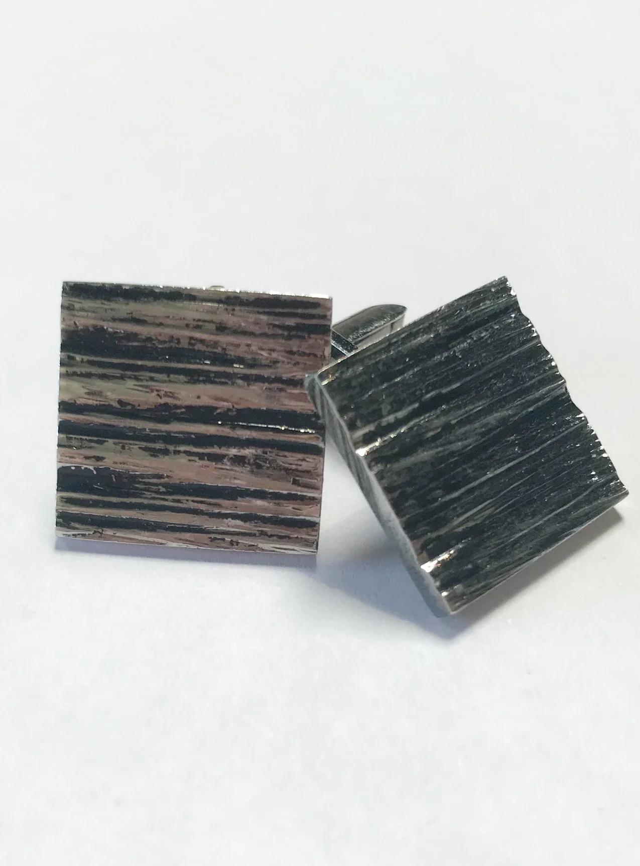 Unknown Artist  1960s Tree Bark Metal Cufflinks  $110.jpg