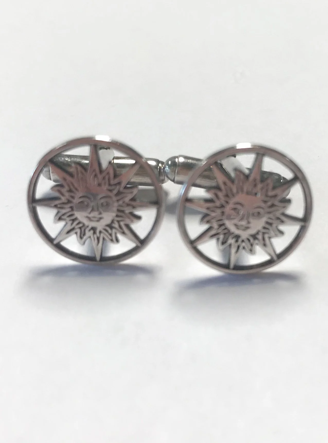 Unknown Artist  1980s  Unique Sun Motif Metal Cufflinks $180.jpg