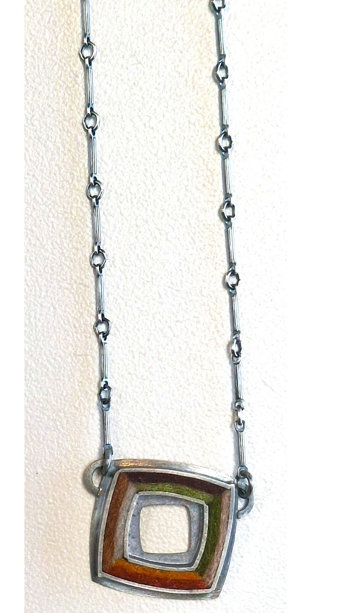 Michele Friedman  Pendants Necklaces Square Donut Pendant Warm.jpg