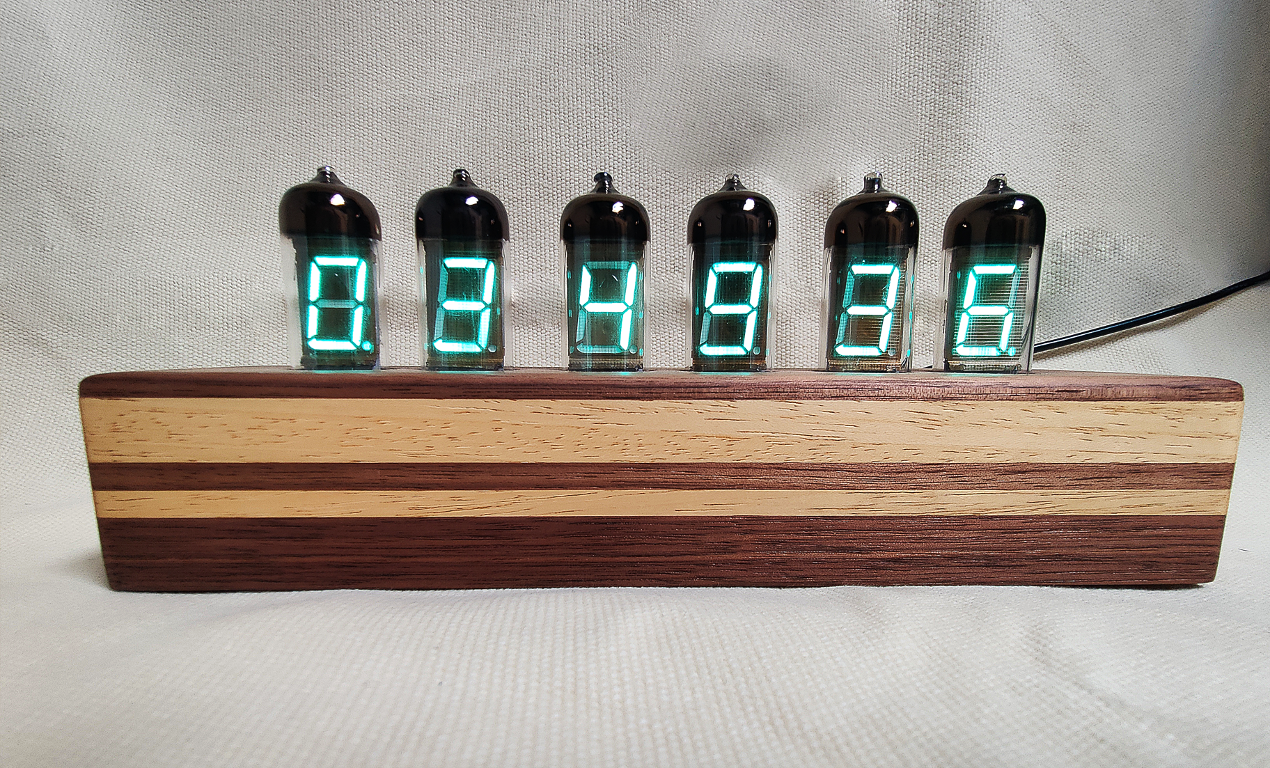 Walnut and Abachi 6 digit VFD with Plug view in light.png
