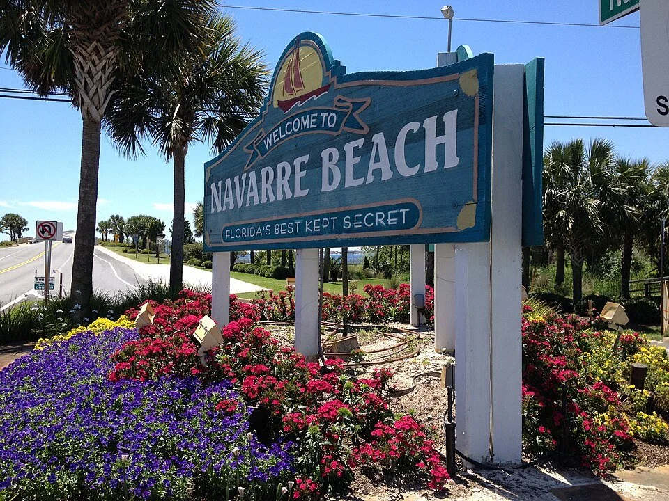 Navarre Beach, FL welcome sign on Santa Rosa Island in Santa Rosa County