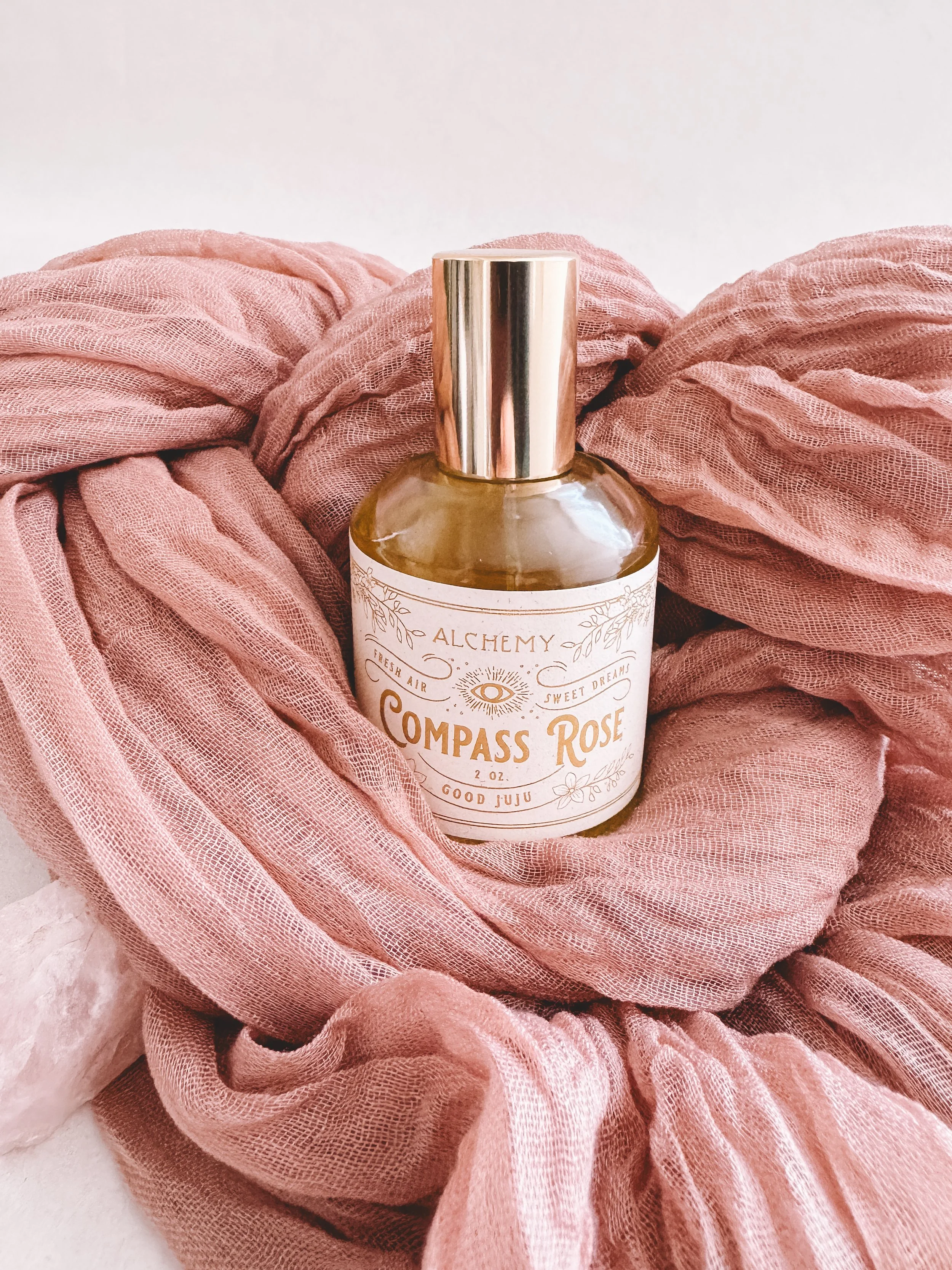 compass rose with rosey scarf and rose quartz.JPG