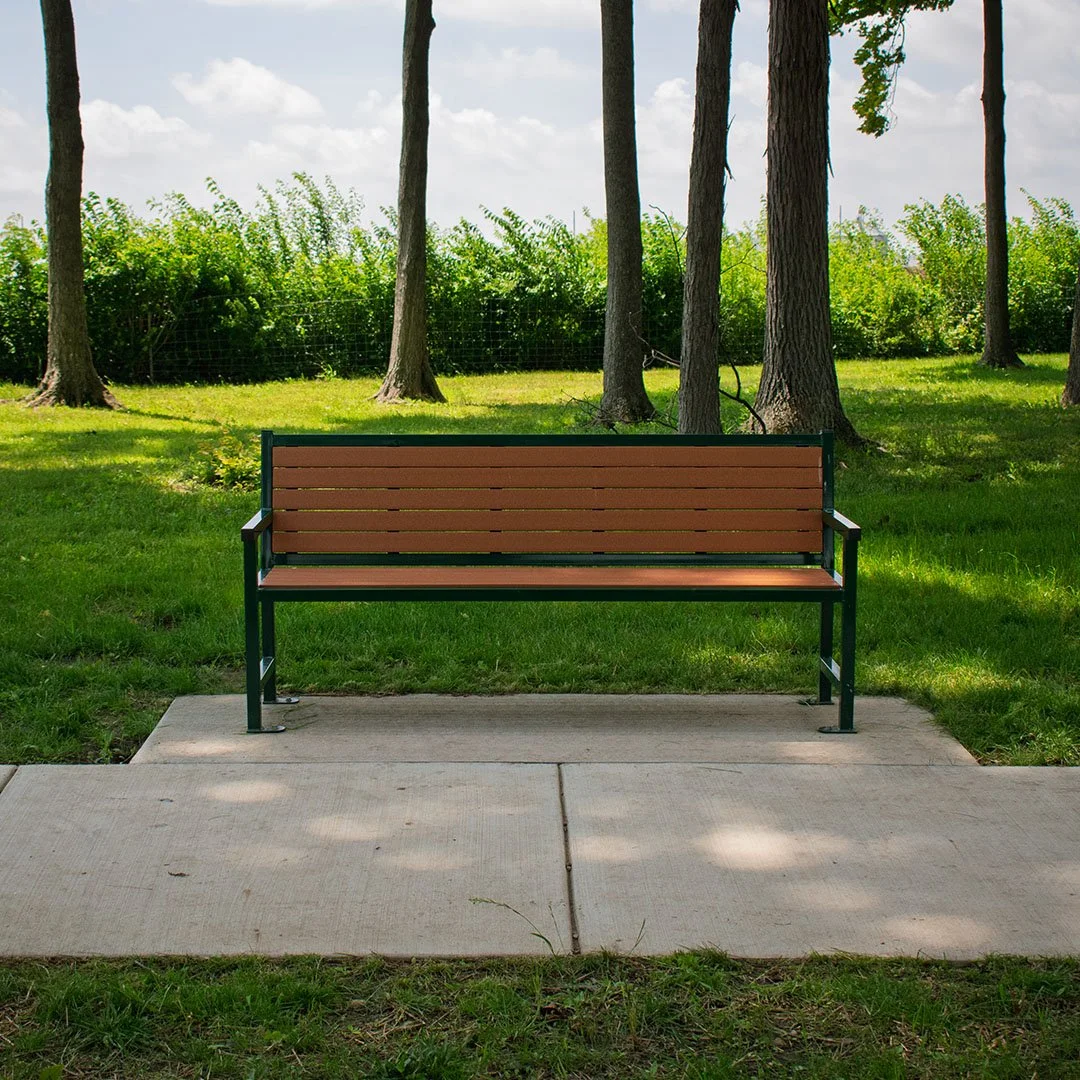 Commercial park bench with recycled plastic slats and steel frame
