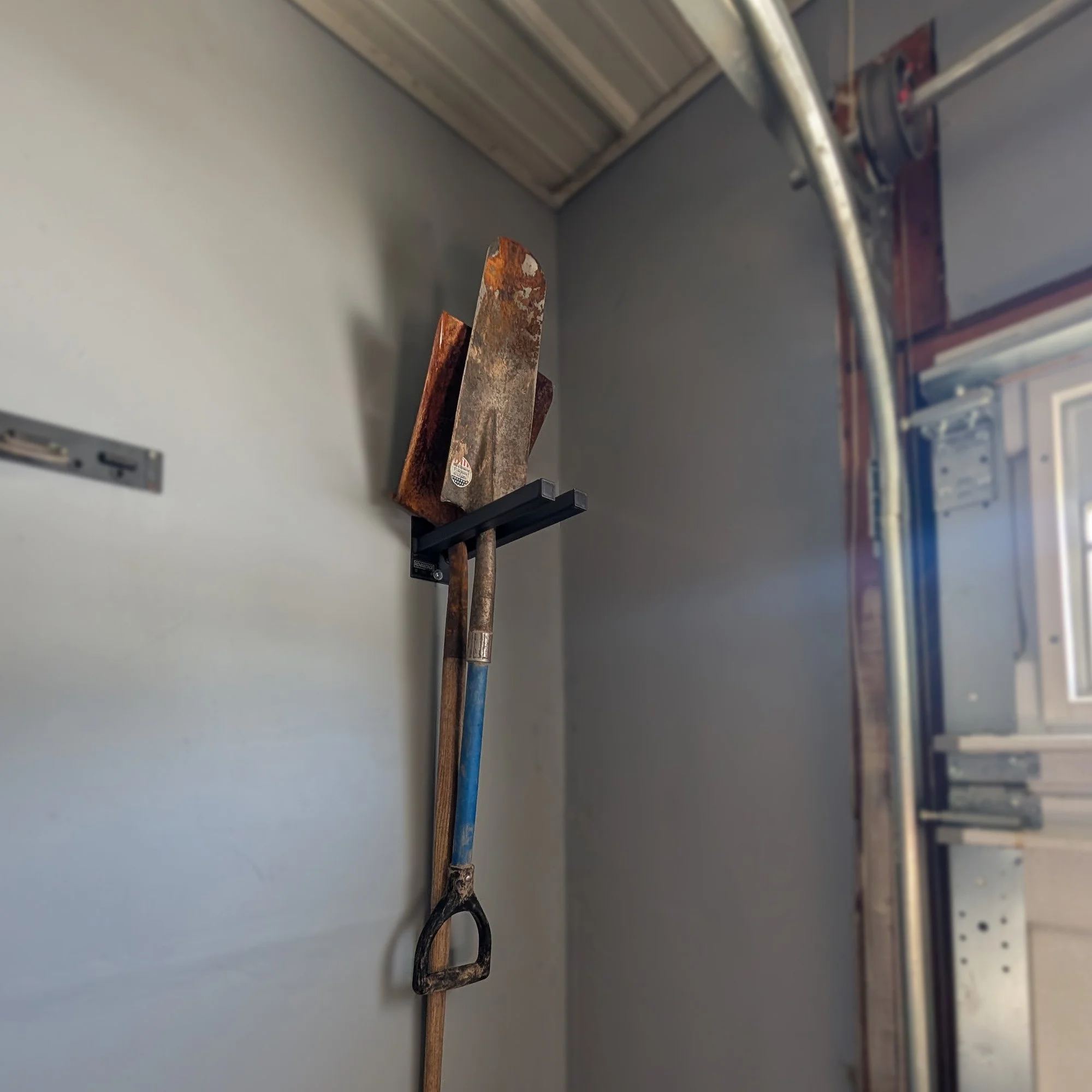 12inch-tool-rack-with-shovels-installed-in-garage.jpg