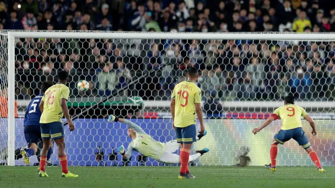 FALCAO PENALTY EARNS COLOMBIA EARNS WIN OVER JAPAN IN QUEIROZ'S FIRST GAME