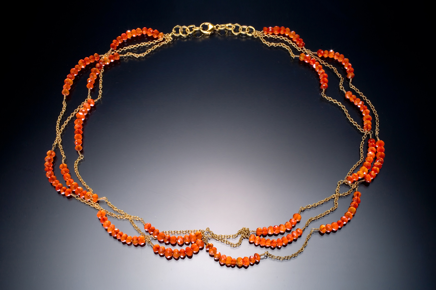 Skip and Stones. 18K Gold, Carnelian.