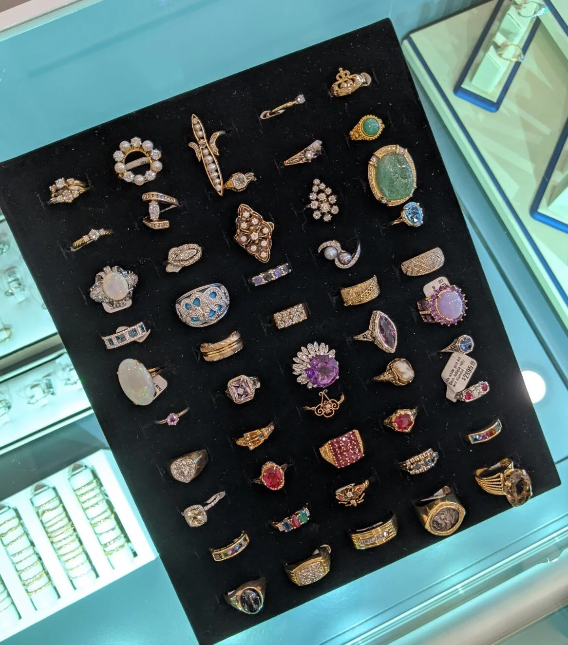 Rows of rings from Rhoma Young’s collection. Which one catches your eye?