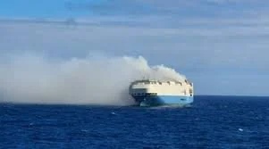 A cargo ship full of luxury cars is on fire and adrift in the middle of the Atlantic