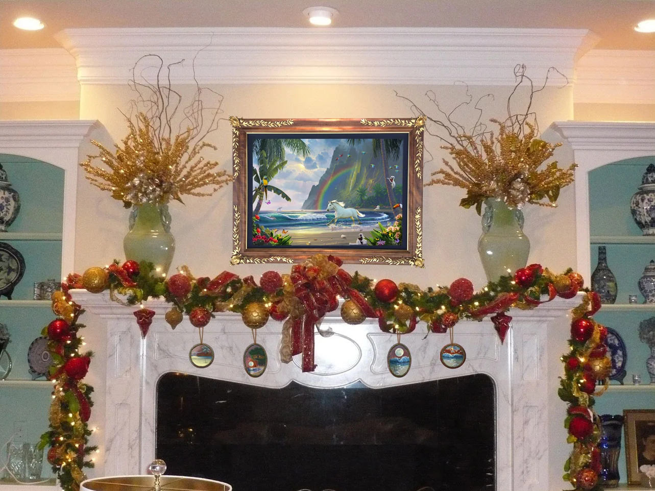 Christmas heirloom Koawood ornaments displayed on a fireplace hearth in a privet collection