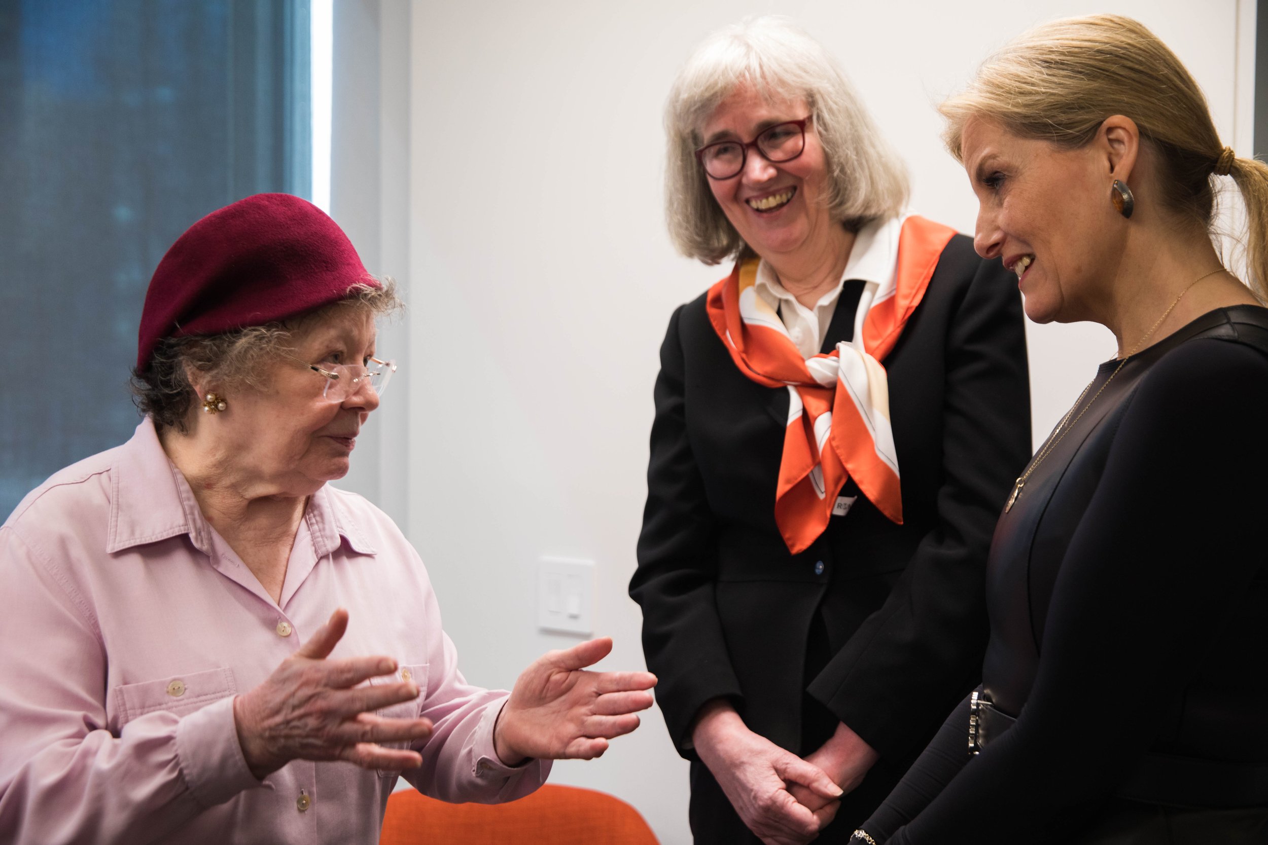  The Countess (R) speaks with an SGSNY senior beneficiary (L) in the presence of one of SGSNY’s social workers (C) 