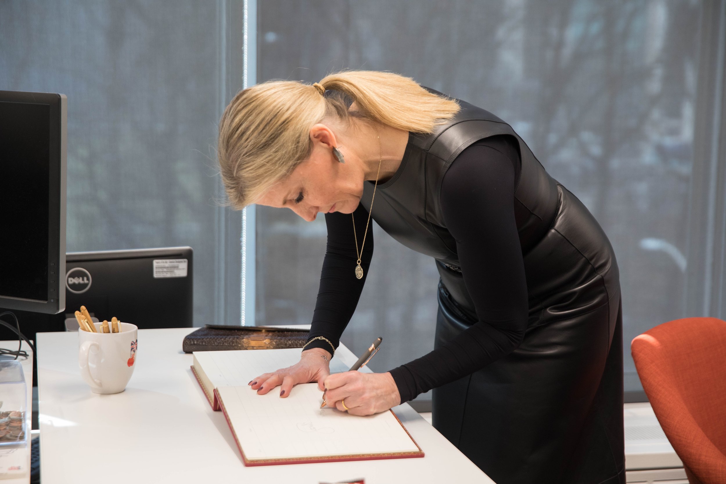  The Countess signs SGSNY’s guest book during her visit to our new office 