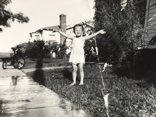Look out world, here I come! A three-year-old San Diego kid launches her passion for the outdoors with a shiny new tricycle and a cooling shower on a hot summer Southern California day.
