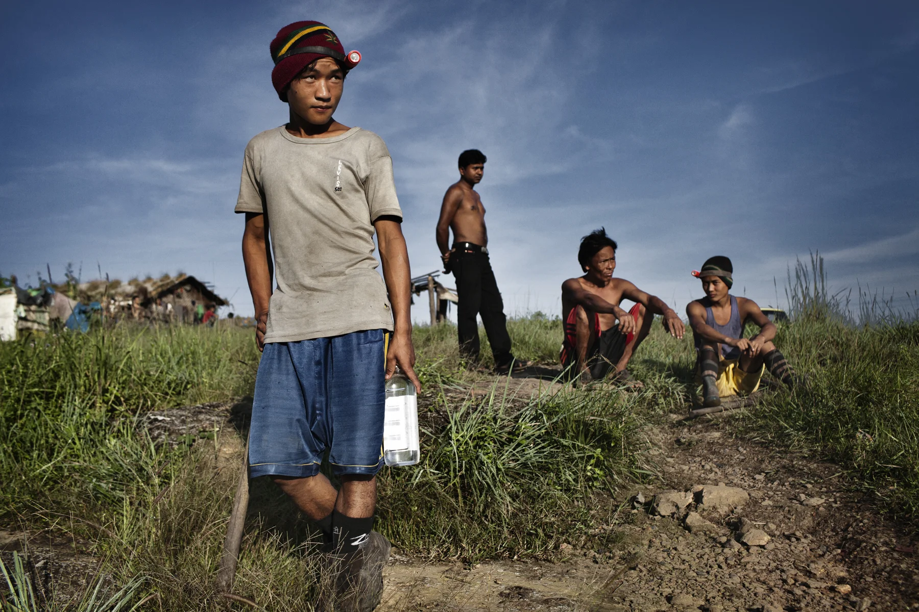 Coal miners rest in a miners' camp in the Jaintia Hills in the Indian state of Meghalaya.