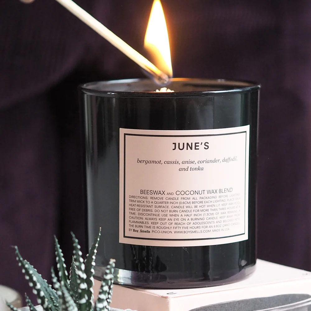 Boy Smells June's Candle.jpg