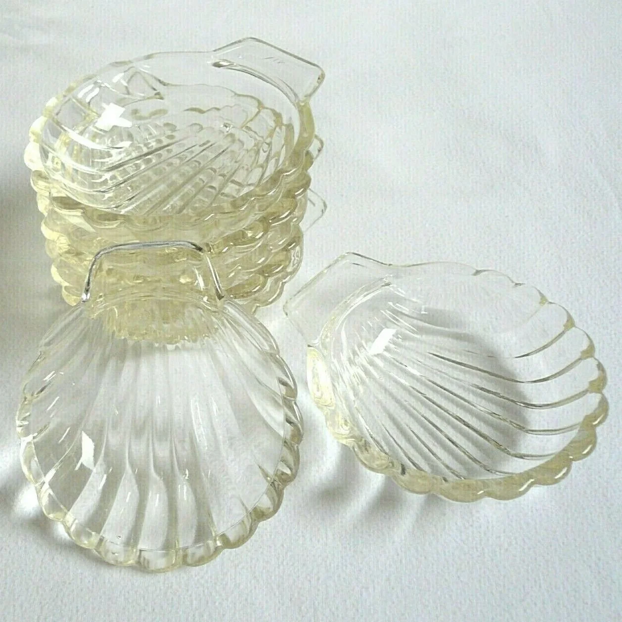 stack of glass shell dishes
