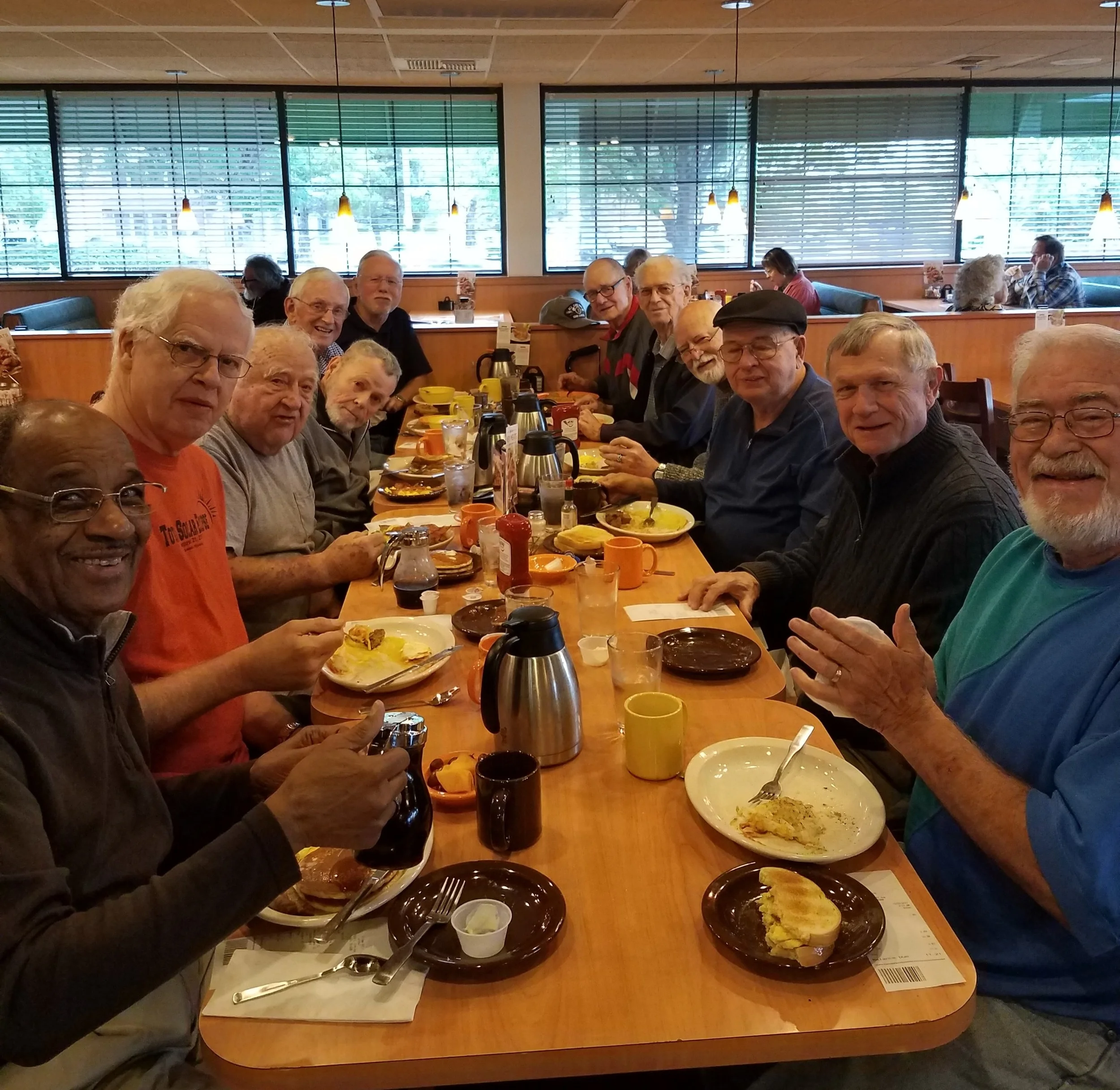 The monthly meeting of the men's group means the guys get together on the first Monday of the month to talk about what's new, what's up and what's for breakfast! Rumor has it, that's the most important meal of the day! Look at those smiles! #breakfastclub #pancakes #mmmbacon