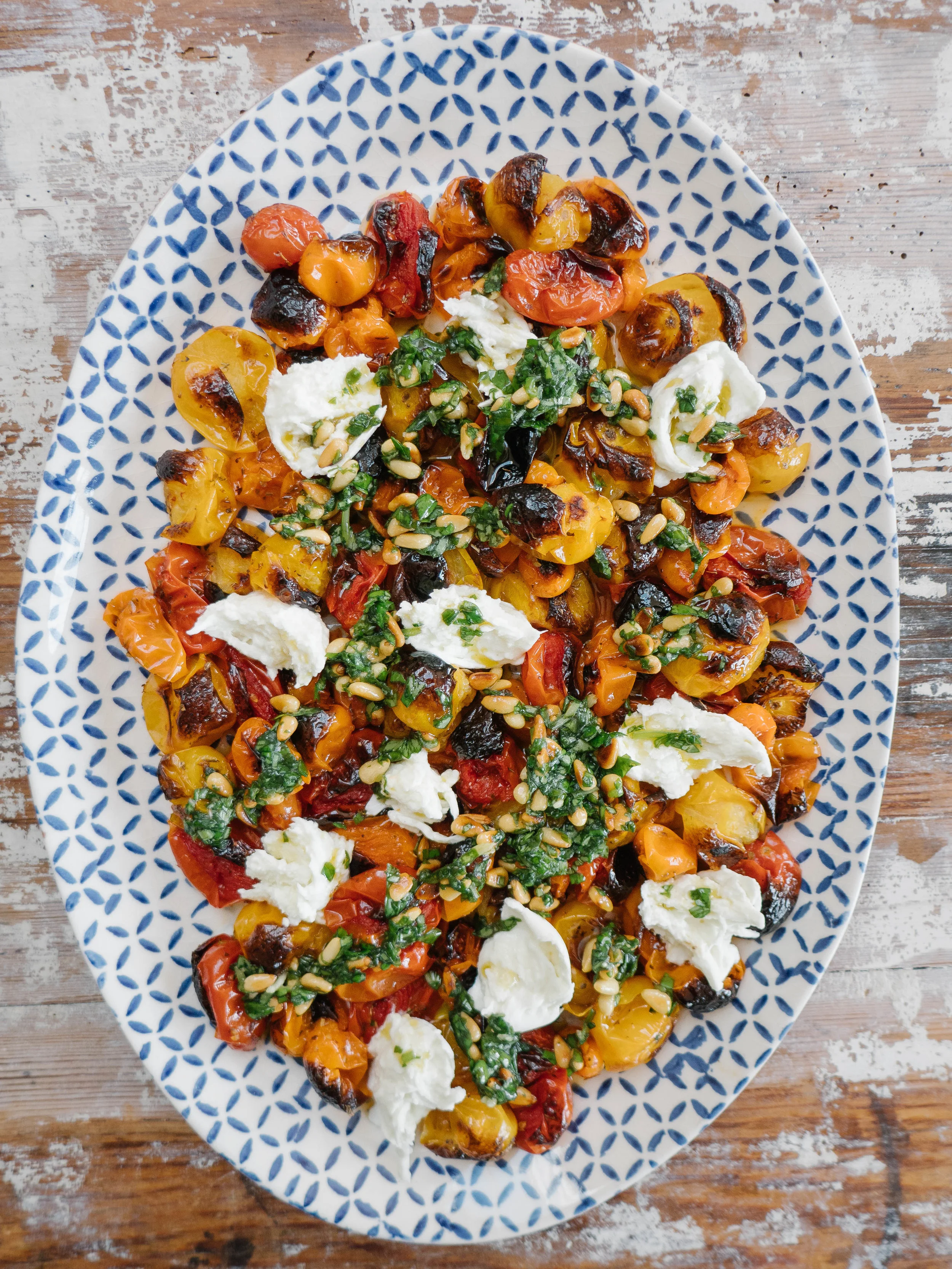 Rainbow roast tomato, mozzarella salad with basil and pine nut oil. 