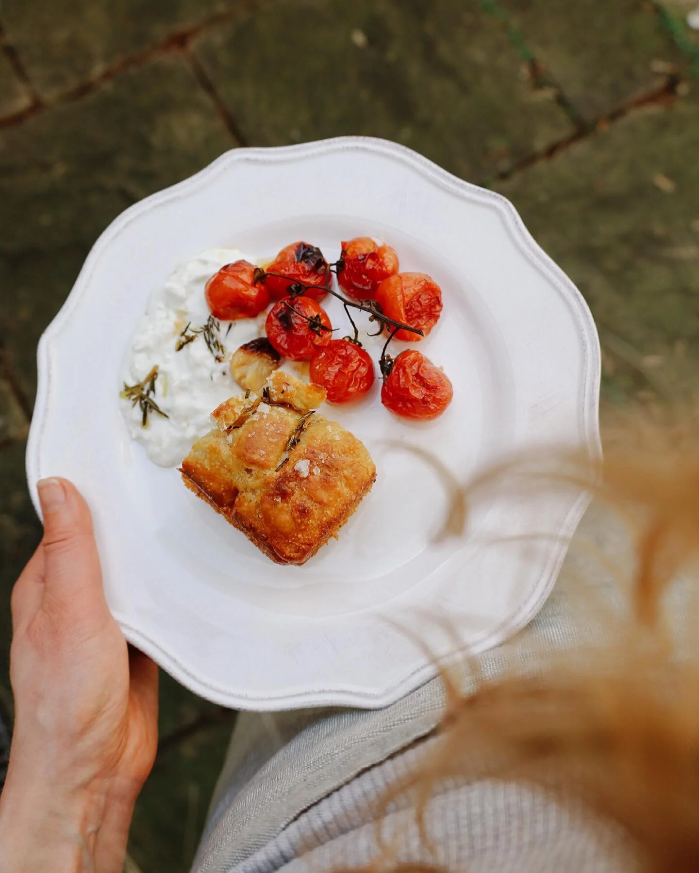 The first of many plates enjoyed over the weekend. Confit tomatoes and garlic with a sloppy burrata and sourdough focaccia, spiked with fennel seed and rosemary and sliced still warm from the oven. Also on the table, a charred chilli and roasted almond pesto (for which I&rsquo;ll share the recipe soon), nocerella olives and a hunk of @granapadano . Tiramisu to finish, and with the weather warm enough to have the windows open it really did feel as though spring was in the air.